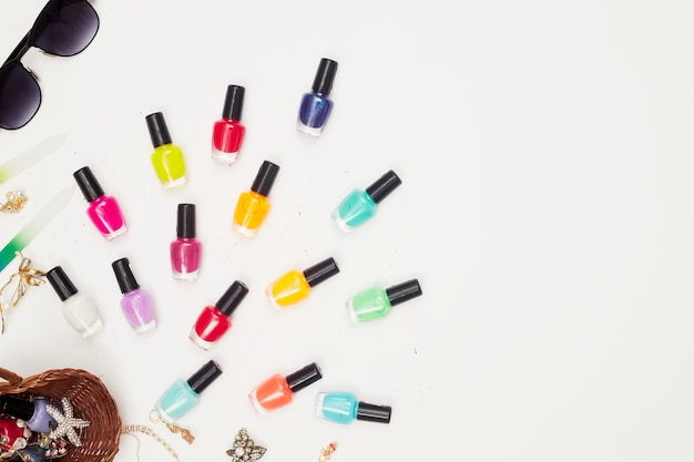 manicure with nail polish, pedicure on white background