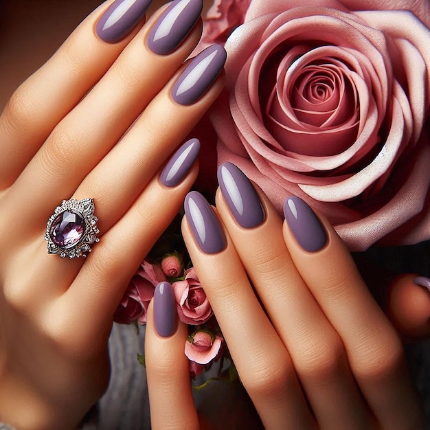 a manicured woman with gem ring