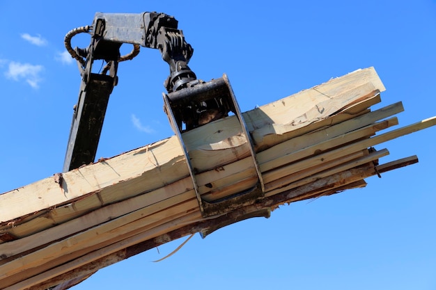 Manipulator for loading or unloading lumber and boards closeup