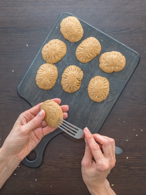 Manual production of cookies for the holiday. Preparation of Egyptian cookies "Kahk El Eid" - cookies of El Fitr Islamic Feast. Ramadan sweets