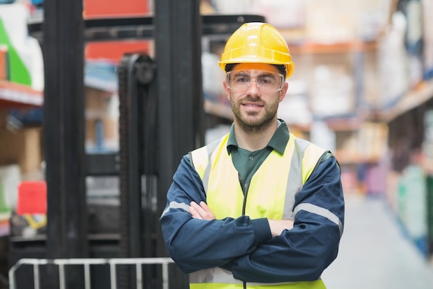 Manual worker wearing hardhat and eyewear