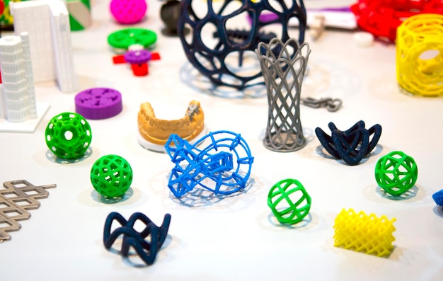 Many abstract models printed by 3d printer closeup