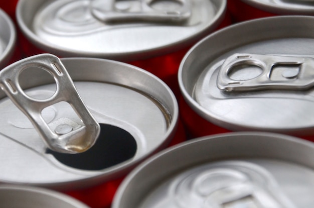 Many aluminium soda drink cans. Advertising for Soda drinks or tin cans mass manufacturing