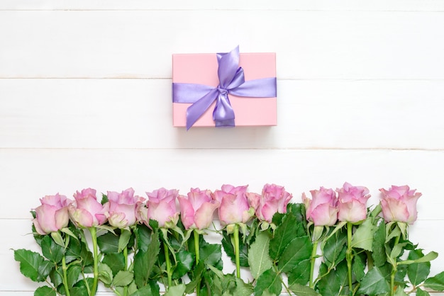 Many beautiful roses on a blackboard, a bouquet of roses