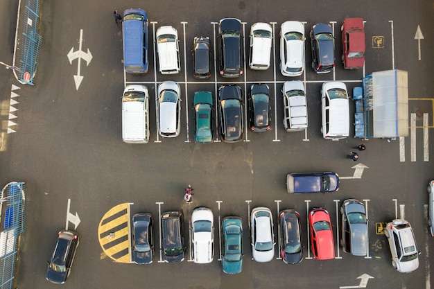 many cars parked on a parking lot