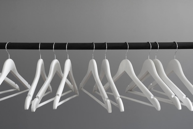 Many clothes hangers on rack abstract creative fashion concept