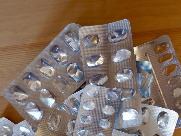 Many empty packages on the wooden table surface in Madrid Spain