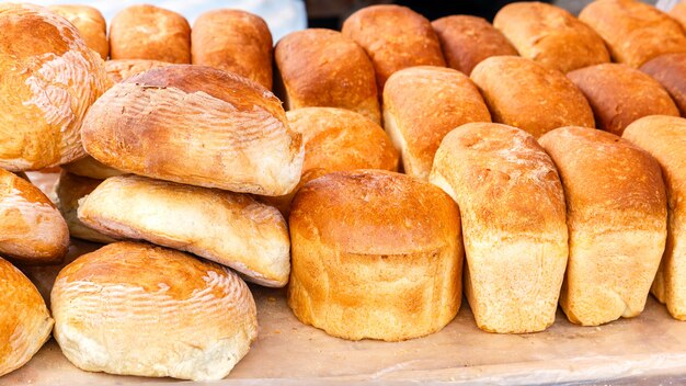 Many loaves of fresh rice bread on the market