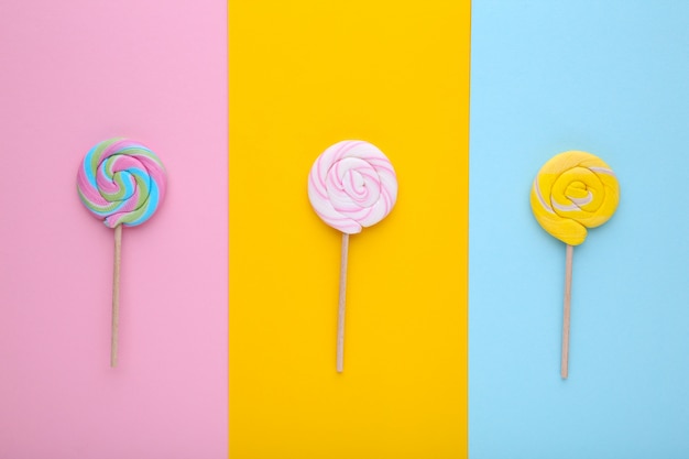 Many lollipops on colorful background, Sweets.