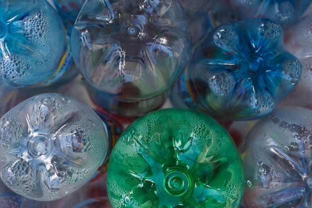 Many plastic bottles close up