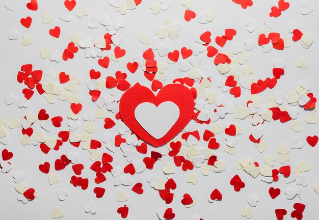 Many red and white heart on white  background