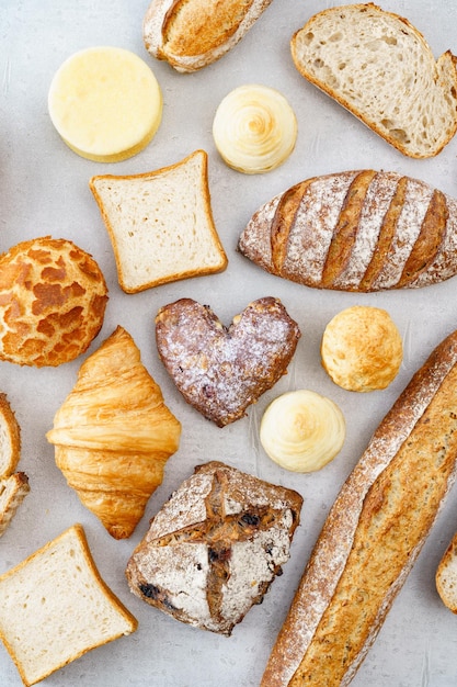 Many shapes and type of breads on the table