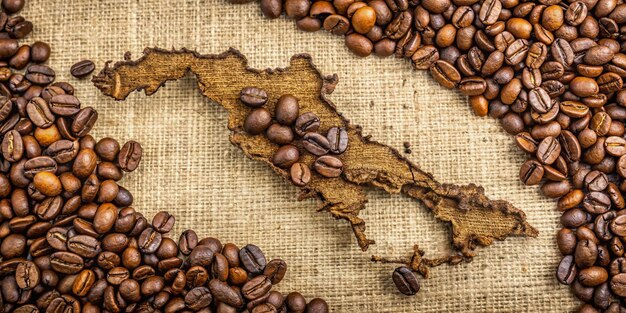 Photo map of papua new guinea with coffee beans background