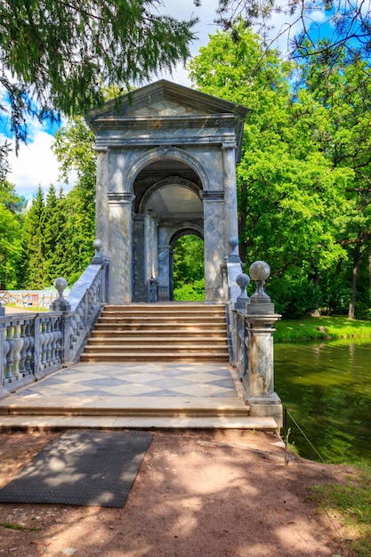 Marble bridge or Siberian Marble Gallery is a decorative pedestrian roofed Palladian bridge gallery walkway in Catherine Park in Pushkin Tsarskoye Selo Russia