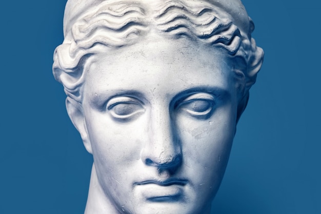 Marble head of young woman, ancient Greek goddess bust isolated. Gypsum copy of a statue Diana head