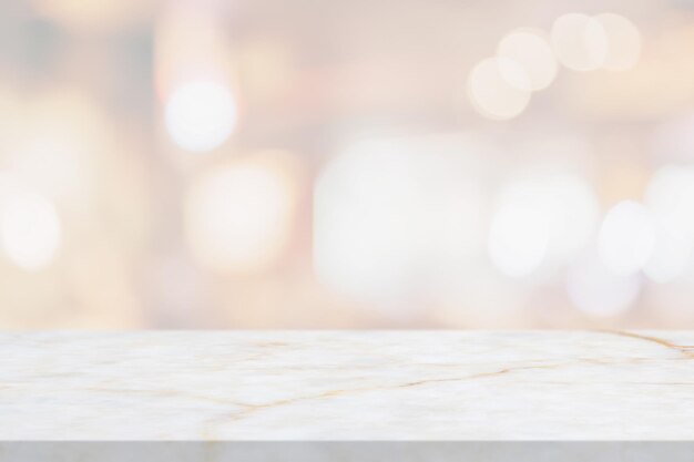 Marble table top with blurred abstract cafe restaurant interior background