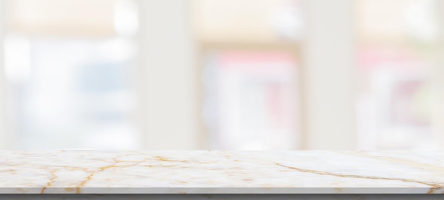 Marble table top with blurred kitchen cafe restaurant interior background