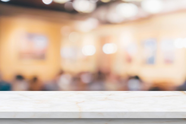 Marble table top with blurred kitchen cafe restaurant interior background