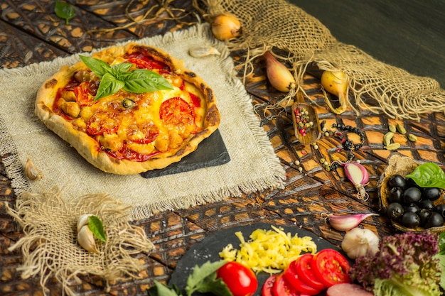 Margarita pizza with ham mushrooms and ketchup