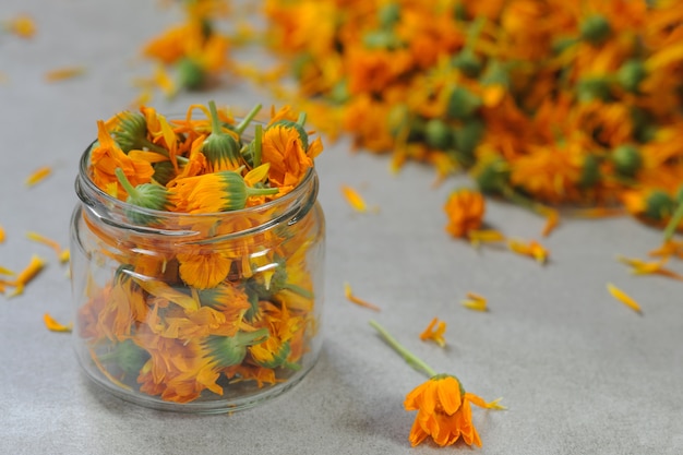 Photo marigold  flowers in the glass jar.