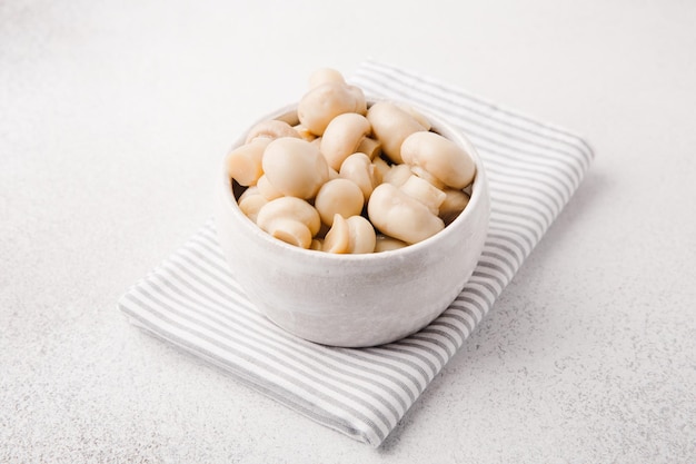 Marinated champignons in a bowl Ready to eating