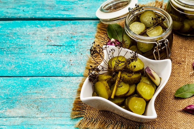 Marinated pickled cucumbers with spices and herbs