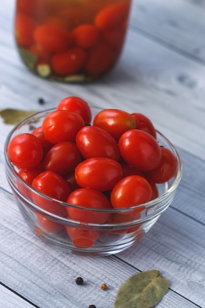 Marinated tomatoes with spices in plate Homemade canning Pickled Vegetables