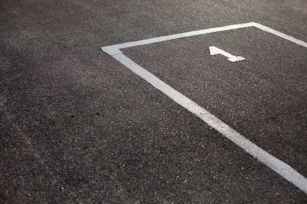 Marked parking spot on asphalt