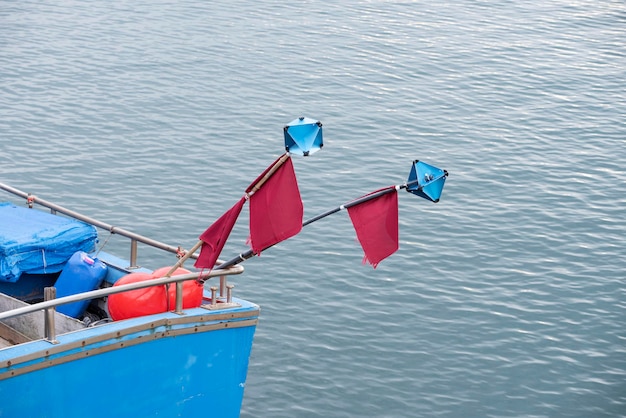 Markers with flags and buoy