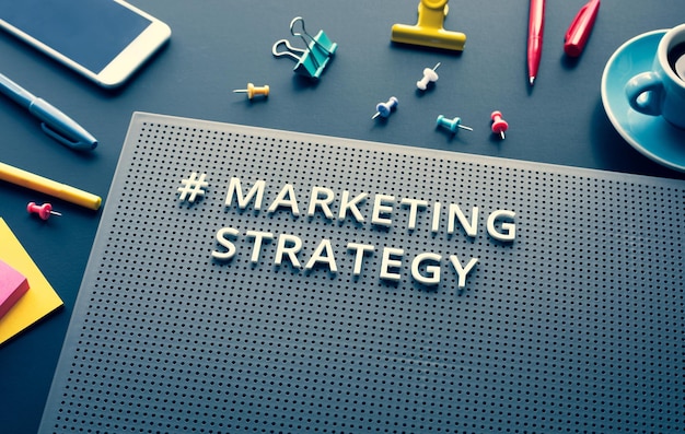 Photo marketing strategy text on modern deskbusiness creativitybranding to success