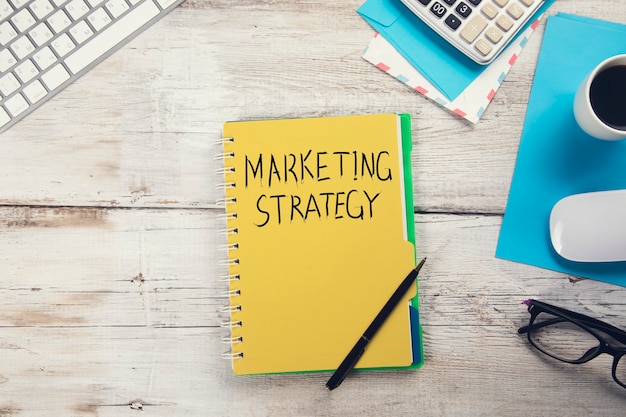 Marketing strategy with keyboard on working table