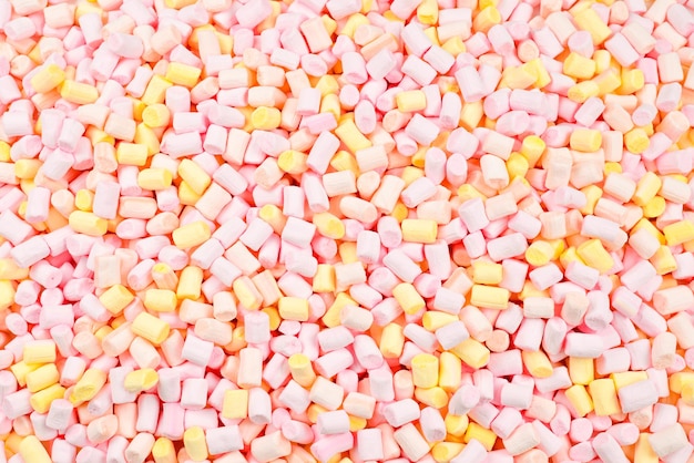 Marshmallow Background of pink and yellow colorful mini marshmallows