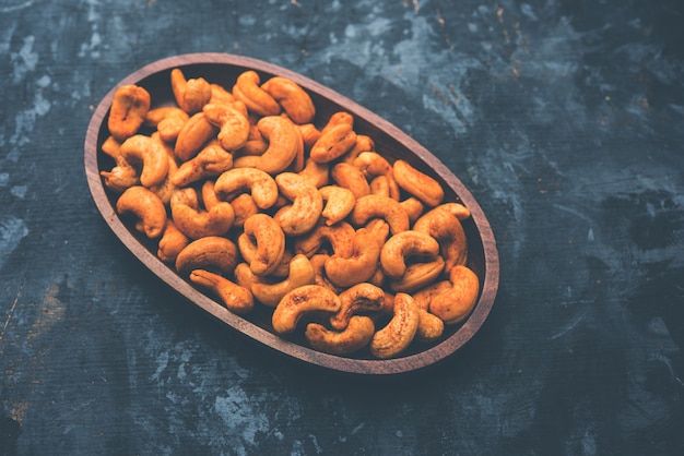 Masala Kaju or spicy Cashew in a bowl. Popular festival snack from India, asia, also known as Chakna recipe