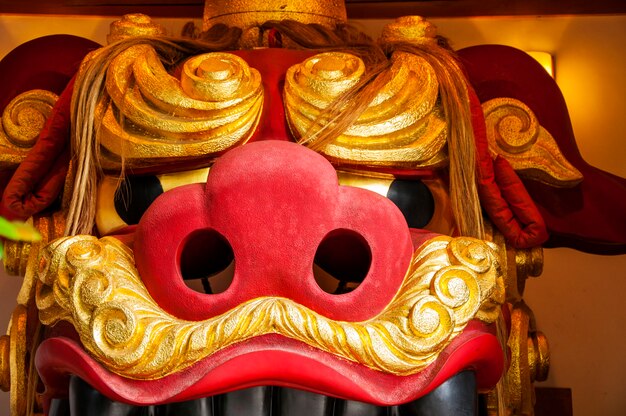 Mascot in a Japanese temple a large lion on the ceiling