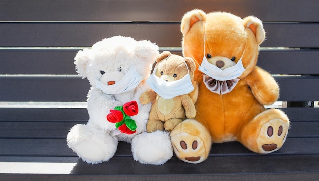 Masked teddy bears at the bus stop