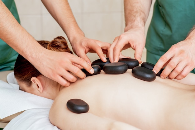 Massage stones on back.