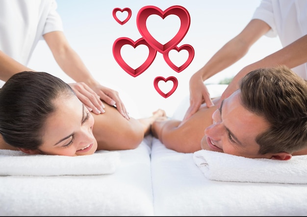 Photo masseur giving massage to couple at spa