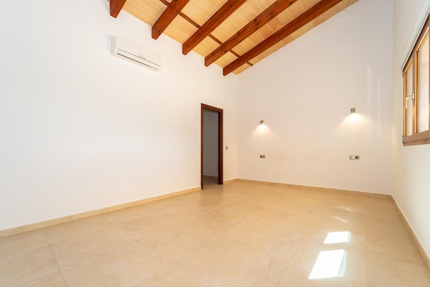 Master bedroom in a country house in Majorca with wooden beams