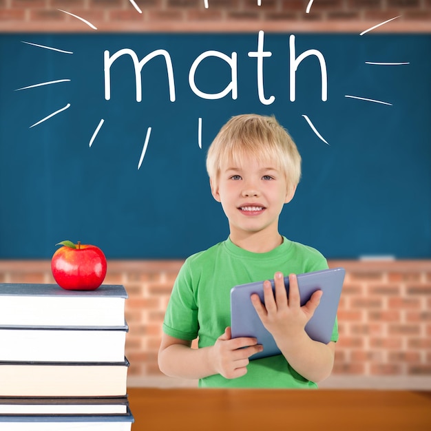 Math against red apple on pile of books in classroom