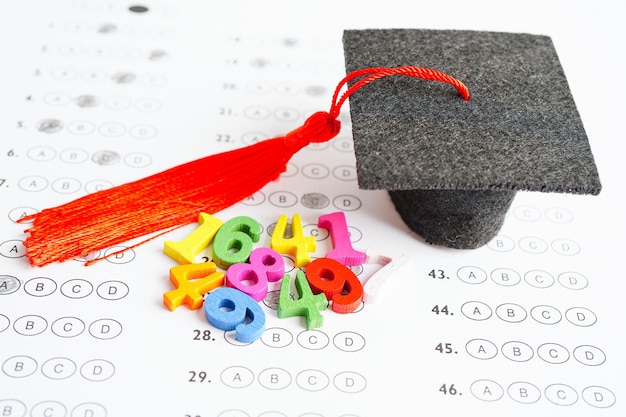 Math number with graduation gap hat on answer sheet test choice for learning Mathematic education math concept