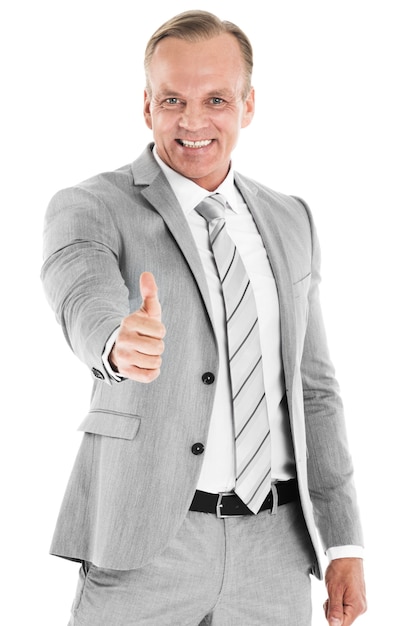 Mature business man showing thumb up gesture, isolated on white surface