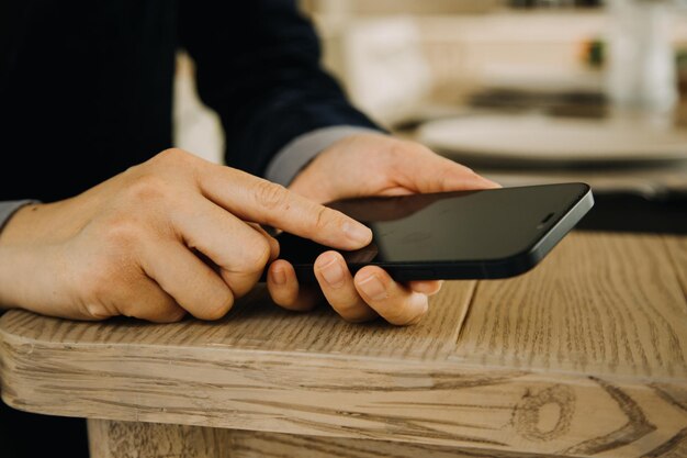 Mature businessman using a digital tablet to discuss information with a younger colleague