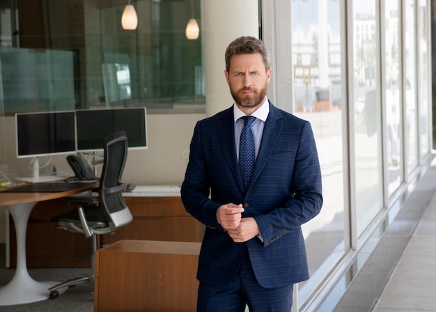 Mature businessperson in formalwear business success successful man in businesslike suit entrepreneur male formal fashion professional unshaven ceo confident businessman wear tie