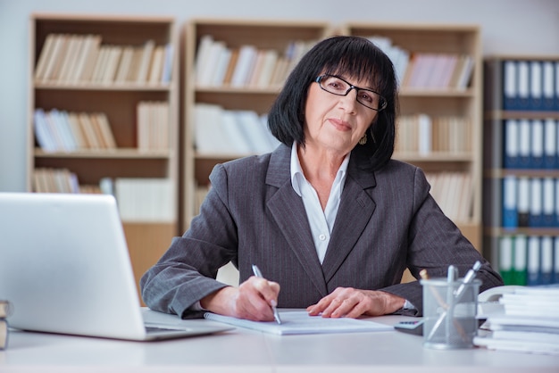 Mature businesswoman working in the office