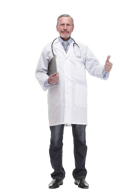 A mature doctor holding a clipboard and posing isolated against white background