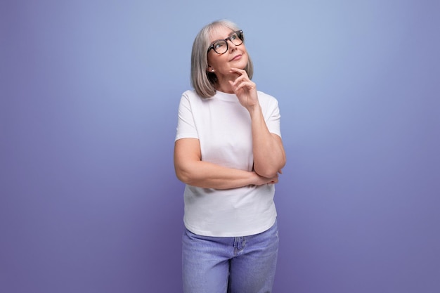 Mature lady with bob haircut posing on studio background with mocap