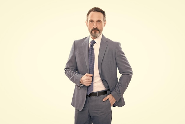 Mature man with grizzled hair in suit isolated on white formal