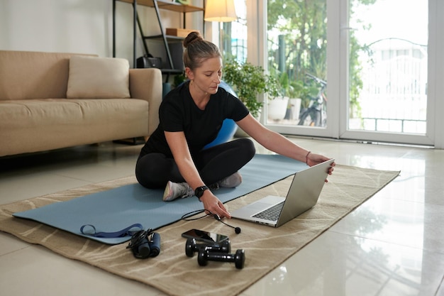 Mature Woman Exercising at Home