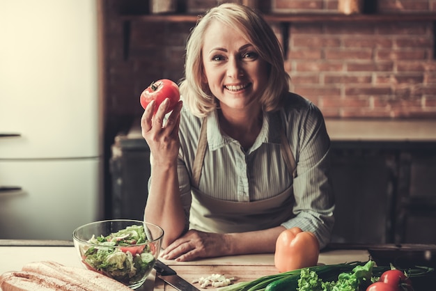 Mature woman in kitchen