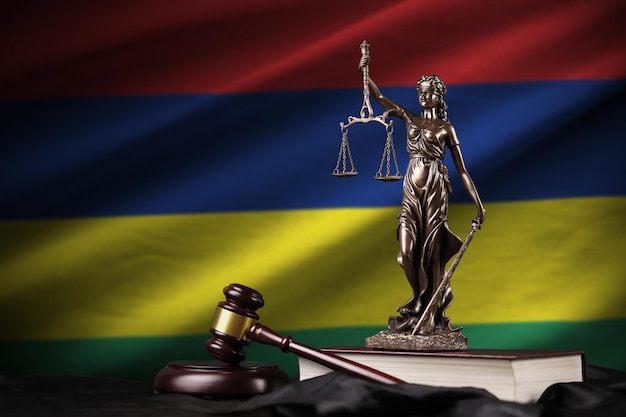 Mauritius flag with statue of lady justice constitution and judge hammer on black drapery Concept of judgement and guilt